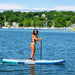 Solstice Watersports 10'6 Cruiser Inflatable Stand-Up Paddleboard Kit - Blue on water